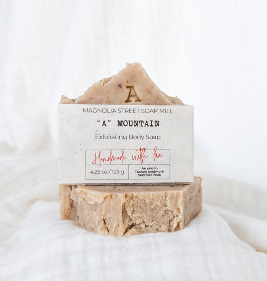 Stacked "A" Mountain / Sentinel Peak bars with white cloth background. Bar soaps that pay homage to a local tucson landmark.