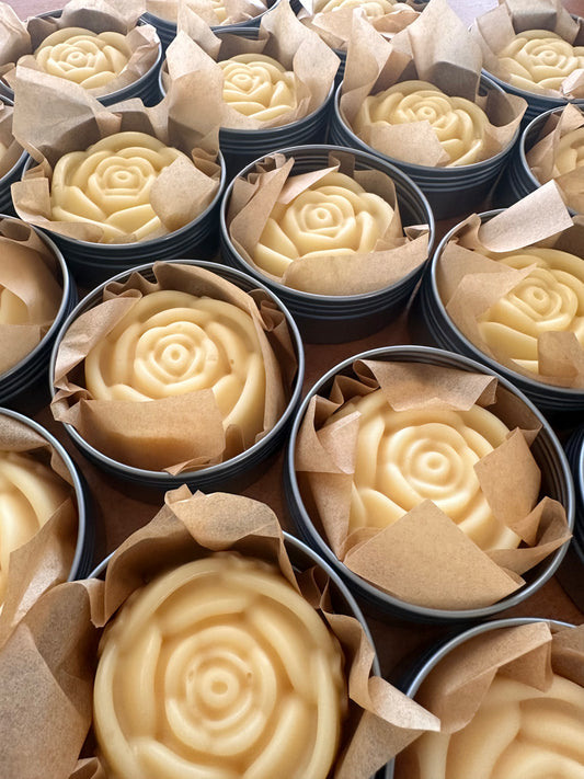 Dozens of Floral Lotion Bars in Tins